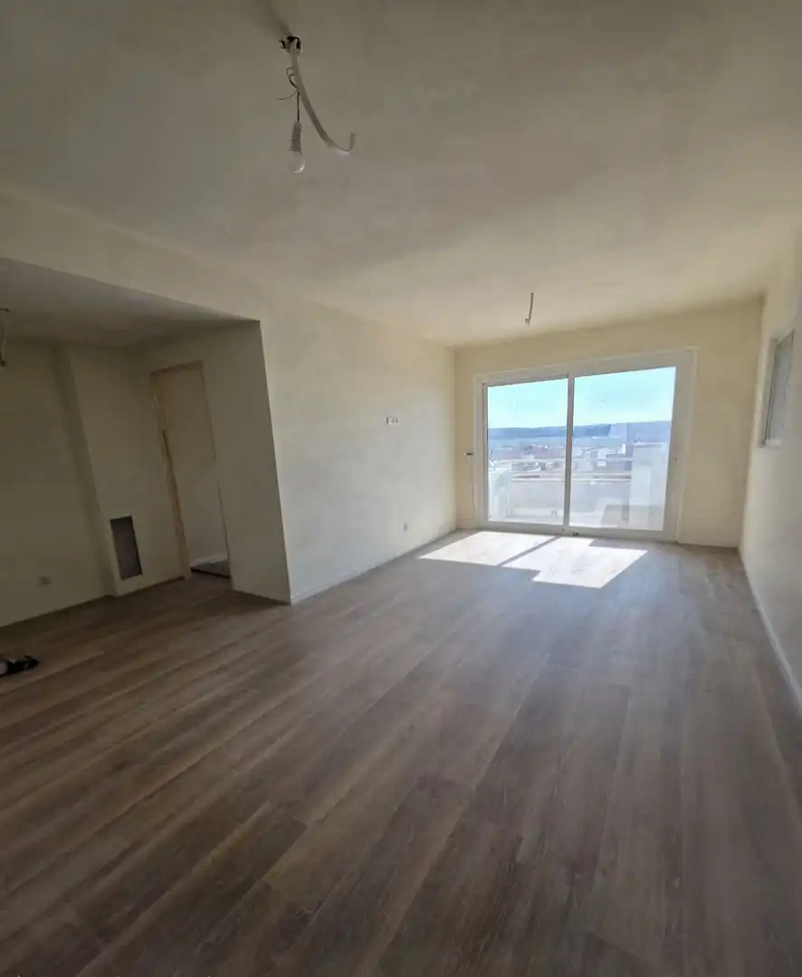 Sala de estar de Piso en venta en Vilallonga del Camp con Aire acondicionado, Calefacción y Parquet