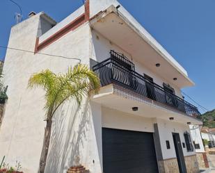 Exterior view of Single-family semi-detached for sale in Viñuela  with Air Conditioner