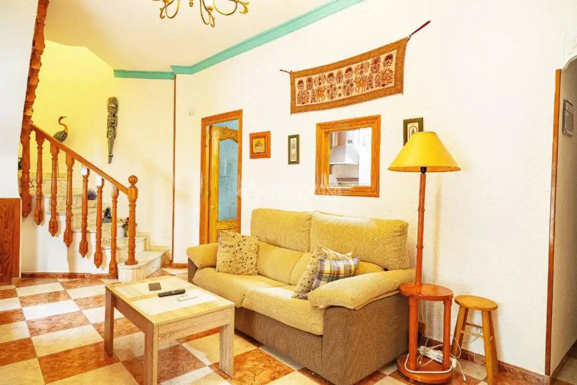 Sala de estar de Casa adosada en venta en Motril con Terraza