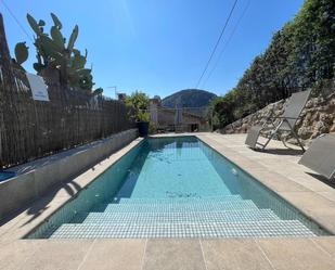 Piscina de Casa adosada de lloguer en Pollença amb Aire condicionat, Piscina i Moblat