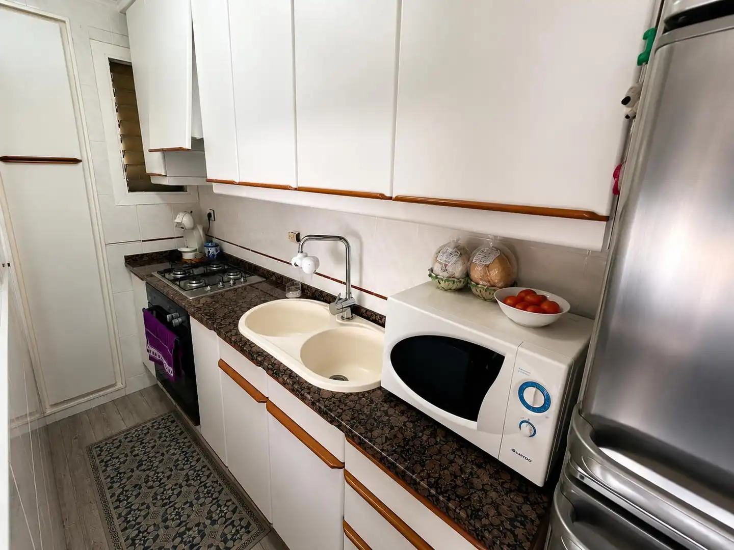 Kitchen of Flat for sale in El Masnou  with Air Conditioner, Storage room and Oven