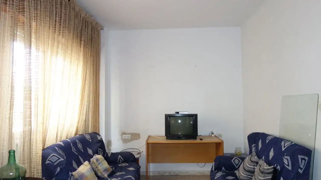 Sala d'estar de Casa adosada en venda en Motril amb Terrassa i Traster