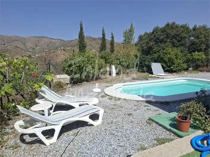 Casa rústica amb piscina en venda a El Borge, imagen 9