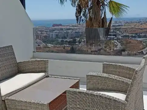 Terrasse von Wohnung zur Miete in Estepona mit Klimaanlage, Privatgarten und Schwimmbad