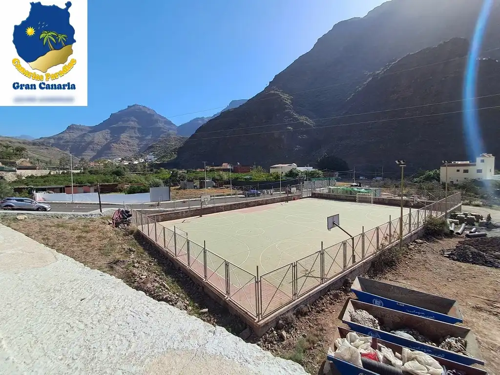 Schwimmbecken von Wohnung zum Verkauf in Mogán mit Privatgarten und Terrasse