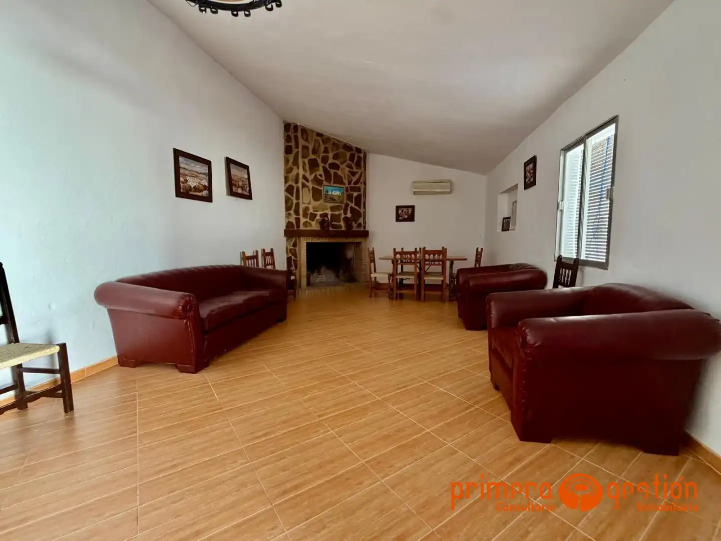 Sala de estar de Casa o chalet en venta en Lora del Río con Trastero y Amueblado