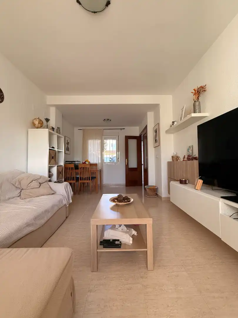 Sala de estar de Casa adosada en venta en Carrión de los Céspedes con Terraza