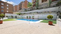 Swimming pool of Attic for sale in  Granada Capital  with Air Conditioner, Heating and Private garden