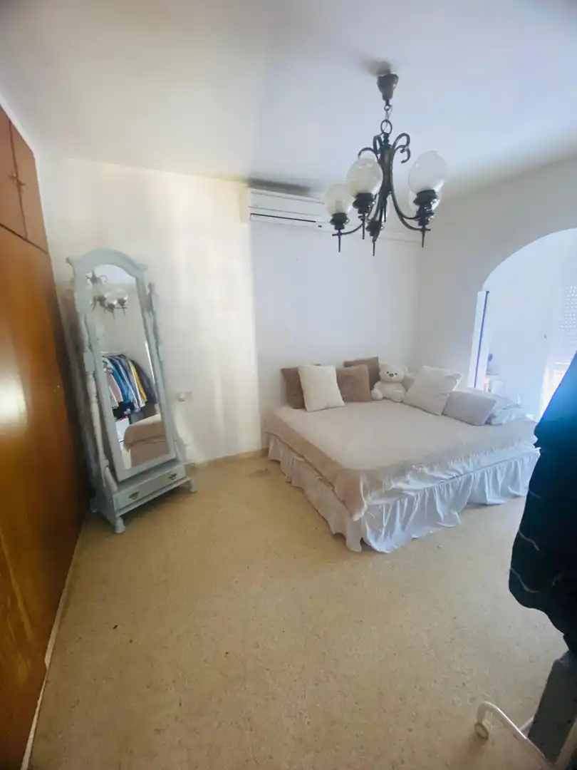 Dormitori de Casa adosada en venda en Estepona amb Terrassa i Piscina comunitària