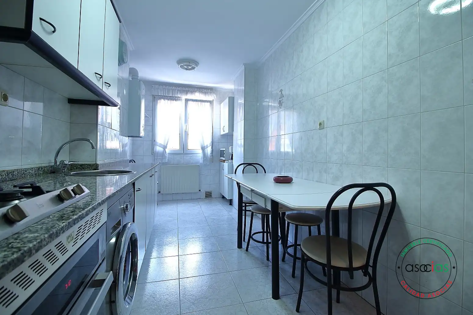Kitchen of Flat for sale in Gijón   with Heating, Parquet flooring and Storage room