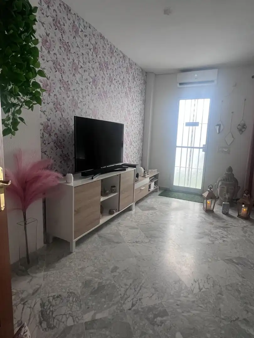 Sala de estar de Casa adosada en venta en Mairena del Alcor