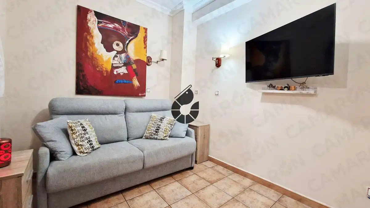 Sala d'estar de Casa adosada en venda en Coria del Río amb Aire condicionat, Terrassa i Balcó