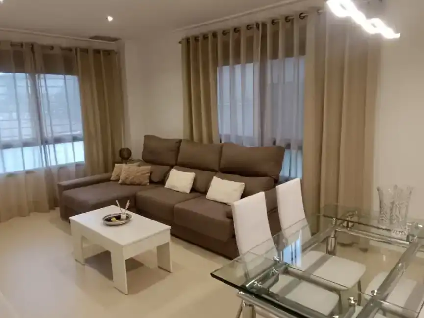 Sala de estar de Estudio de alquiler en Sant Joan d'Alacant con Aire acondicionado, Jardín privado y Piscina