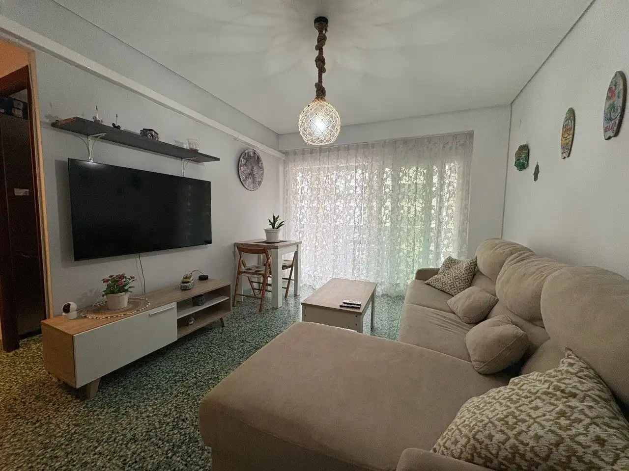 Wohnzimmer von Wohnung zum Verkauf in Cullera mit Klimaanlage, Privatgarten und Terrasse