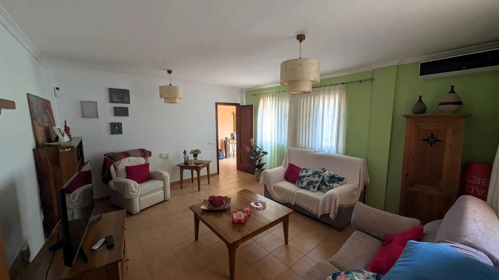 Sala d'estar de Casa adosada en venda en Tuineje amb Aire condicionat, Jardí privat i Terrassa