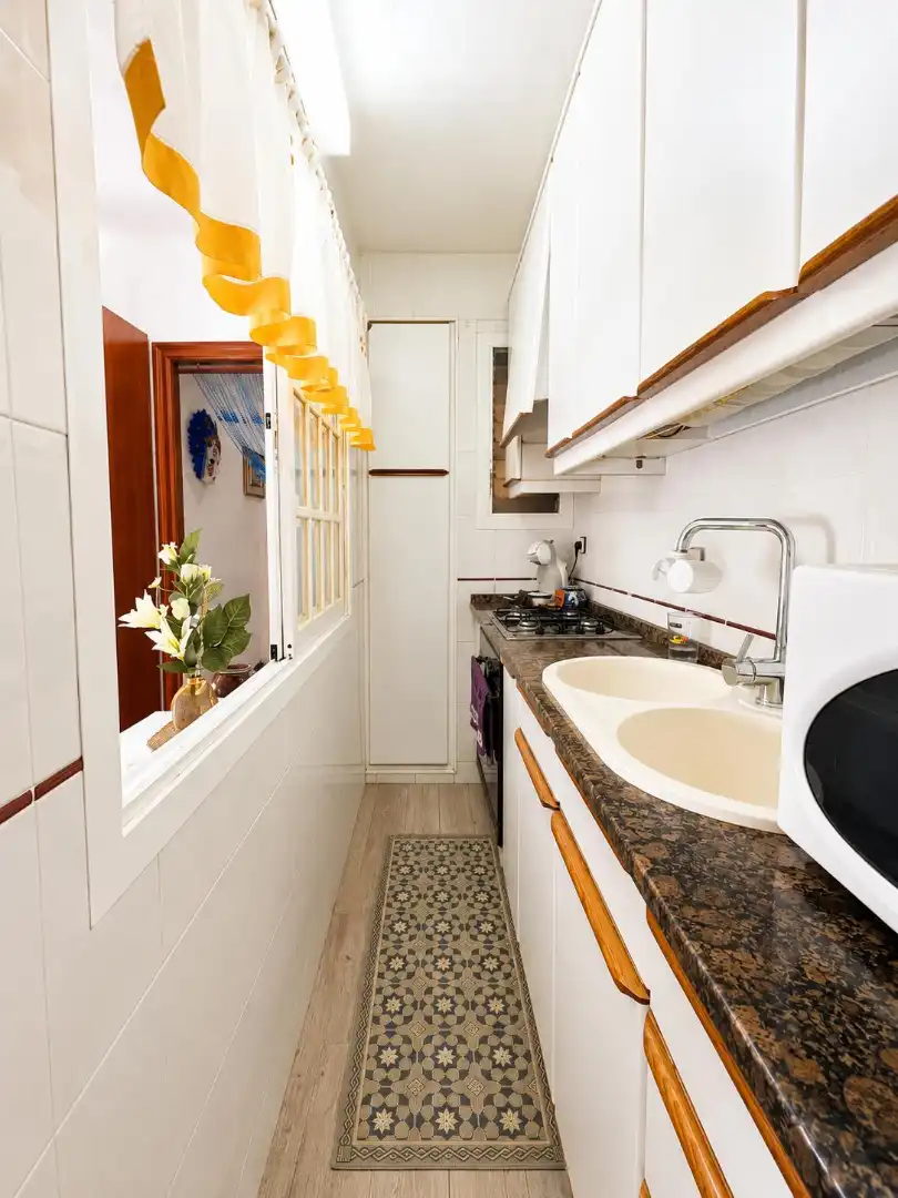 Kitchen of Flat for sale in El Masnou  with Air Conditioner, Storage room and Oven