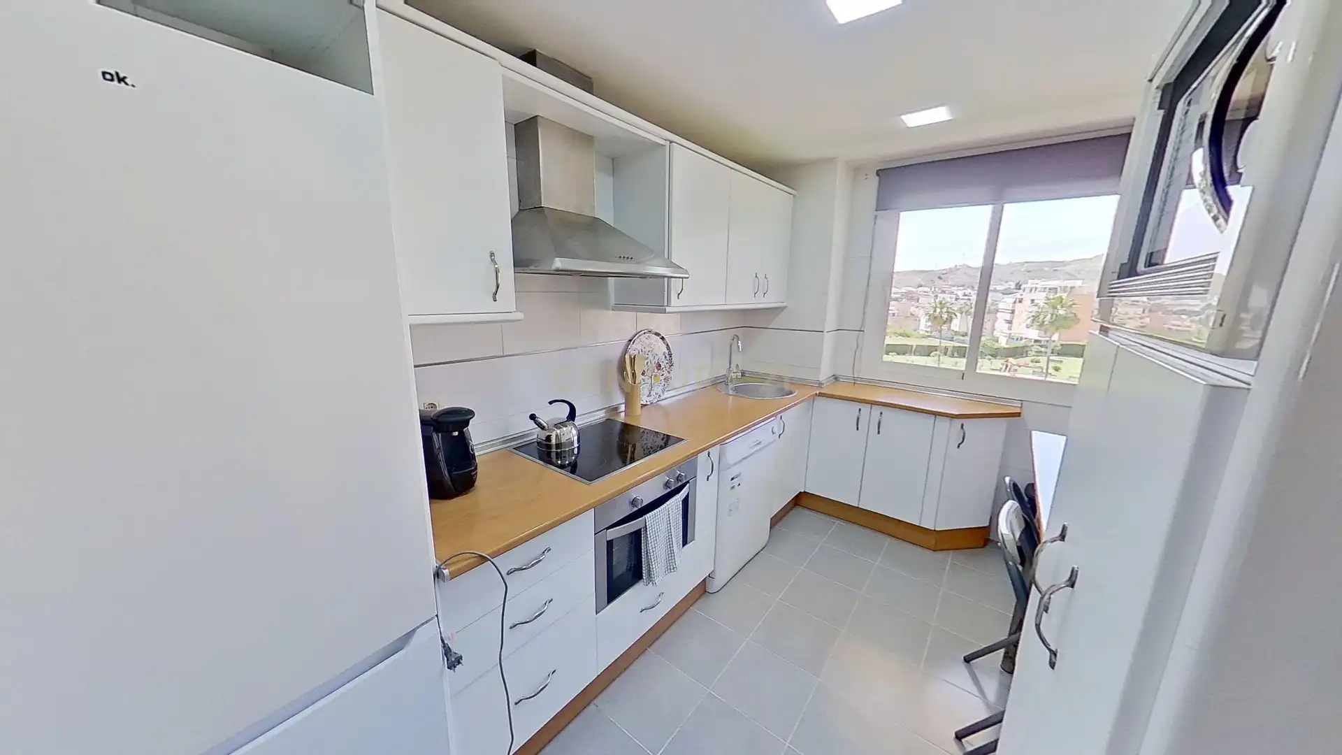 Cocina de Apartamento de alquiler en Málaga con Piscina, Horno y Lavadora