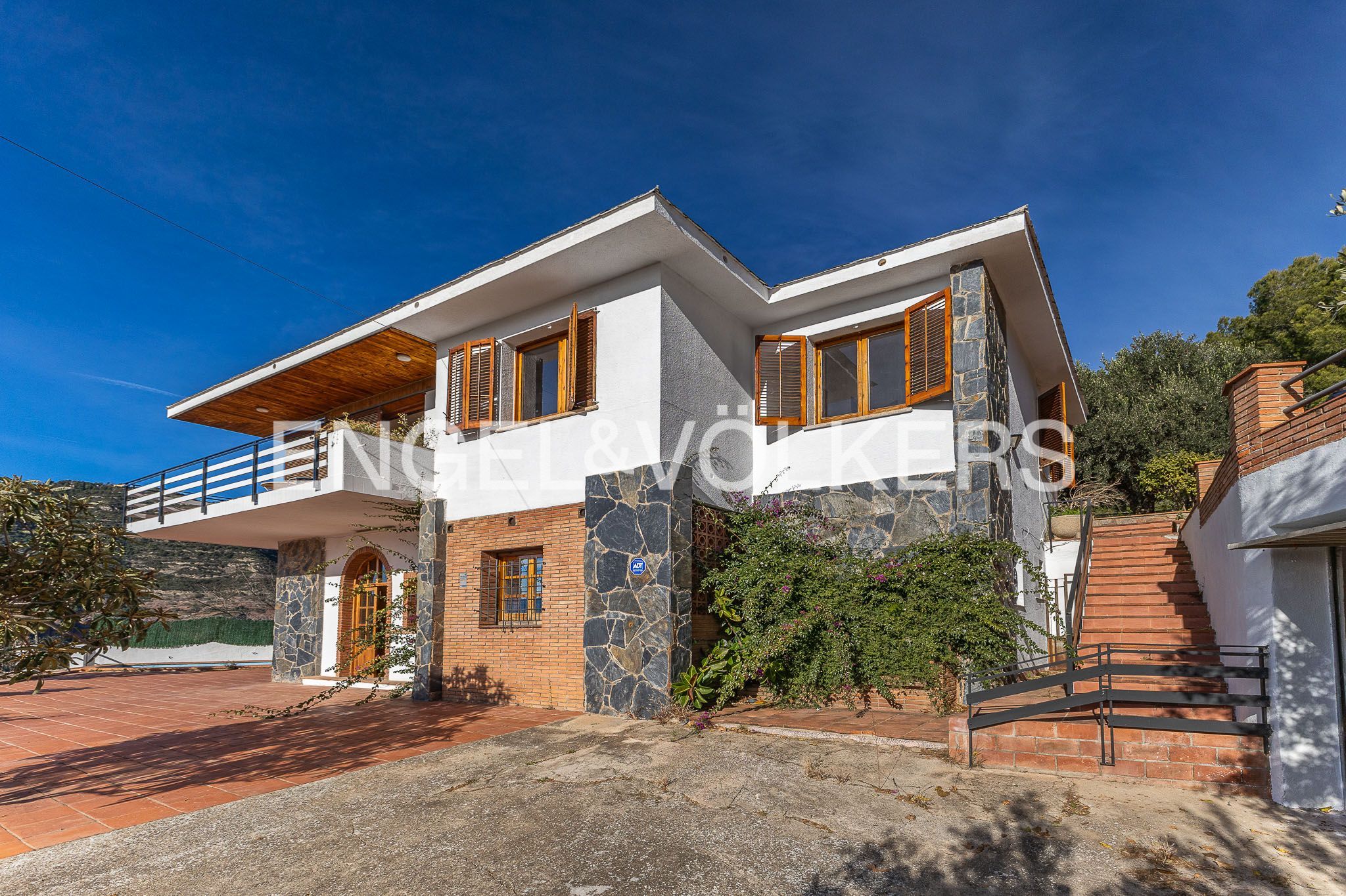 Exterior view of House or chalet for sale in Bigues i Riells del Fai  with Air Conditioner, Heating and Private garden