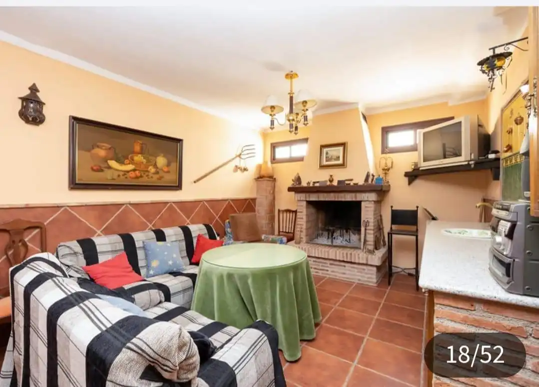 Sala d'estar de Casa o xalet en venda en Nigüelas amb Jardí privat i Piscina comunitària