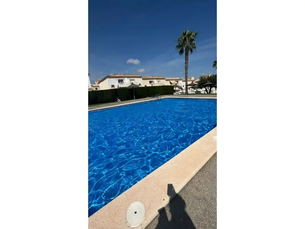 Piscina de Casa adosada en venda en Santa Pola amb Aire condicionat, Moblat i Rentadora