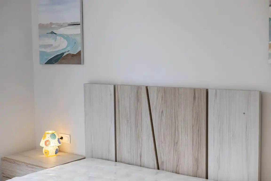 Habitación de Apartamento de alquiler en Dénia con Aire acondicionado, Jardín privado y Terraza