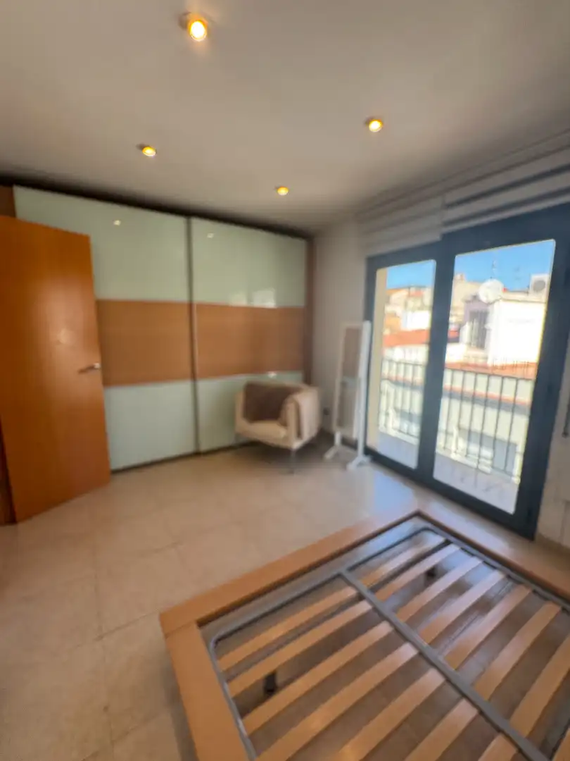 Dormitori de Dúplex de lloguer en Calella amb Aire condicionat, Calefacció i Terrassa