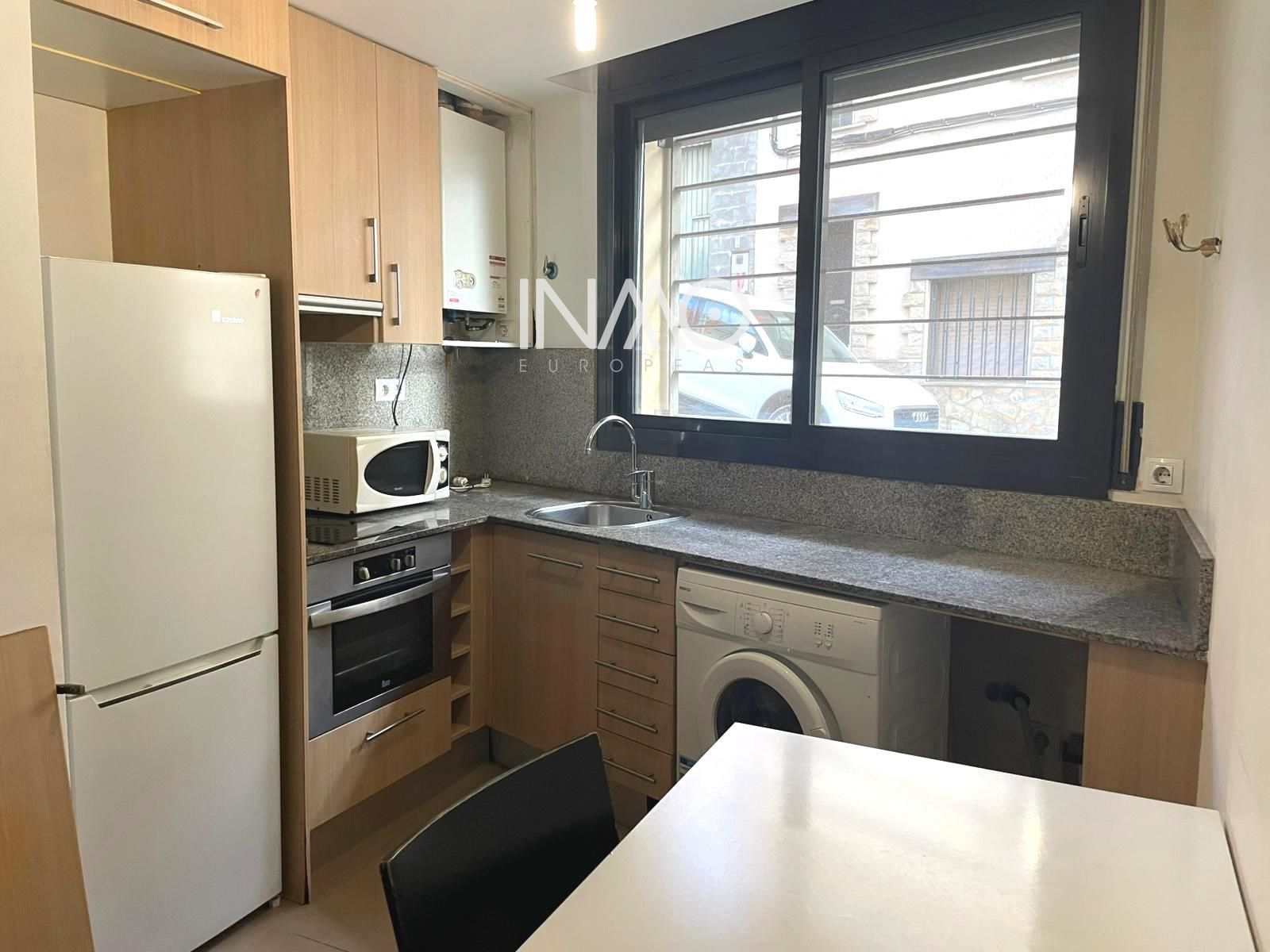Kitchen of Flat for sale in Rubí  with Heating and Storage room