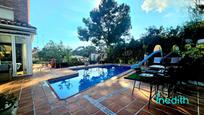 Swimming pool of Single-family semi-detached for sale in Castelldefels  with Air Conditioner, Heating and Private garden