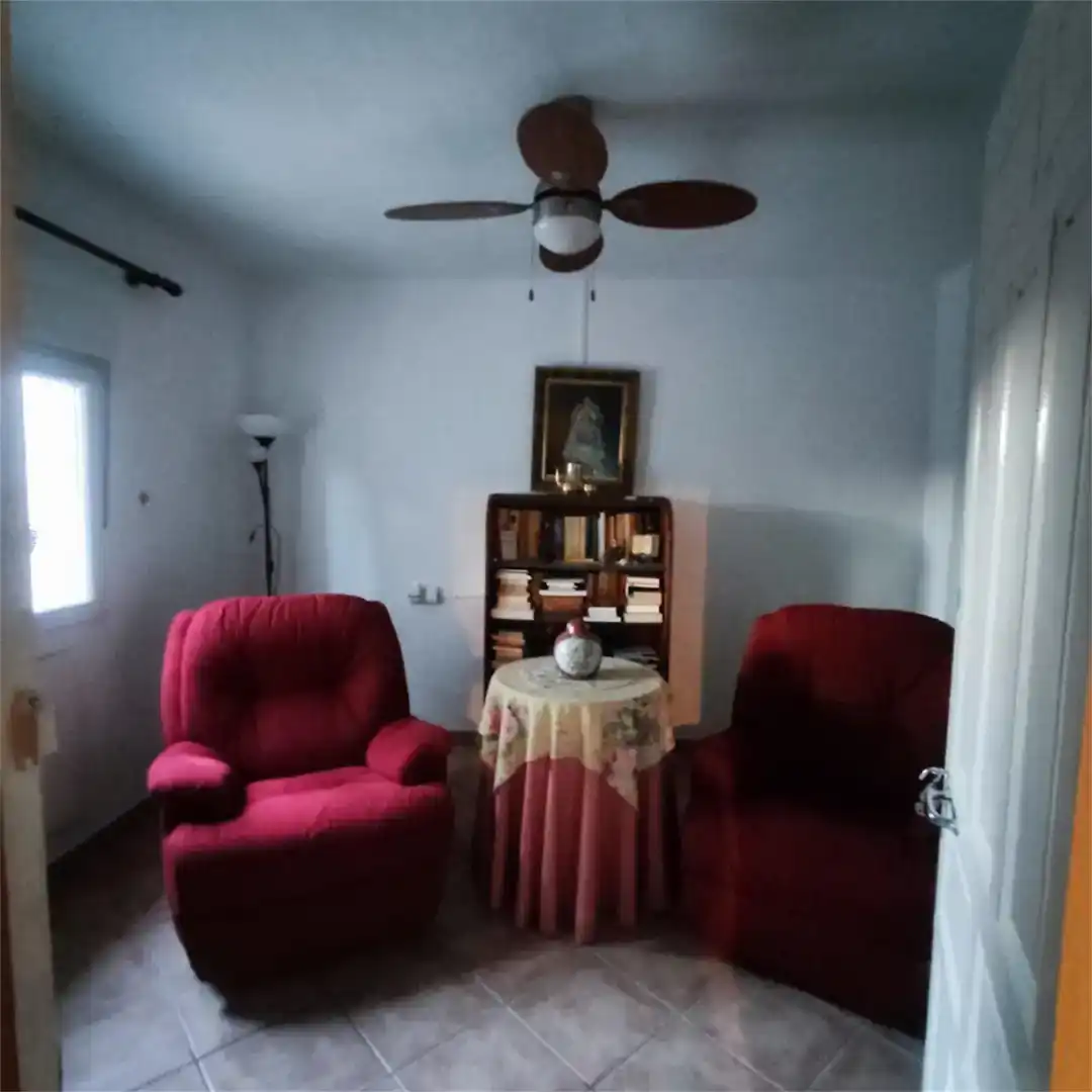 Sala d'estar de Casa adosada en venda en Álora amb Jardí privat, Traster i Piscina