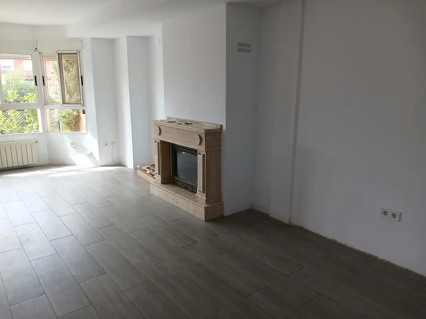 Sala de estar de Casa adosada en venta en Plaza Xúquer