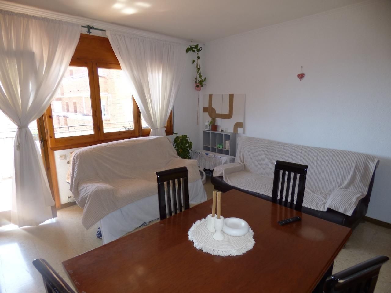 Wohnzimmer von Dachboden zum verkauf in Malgrat de Mar mit Heizung und Balkon