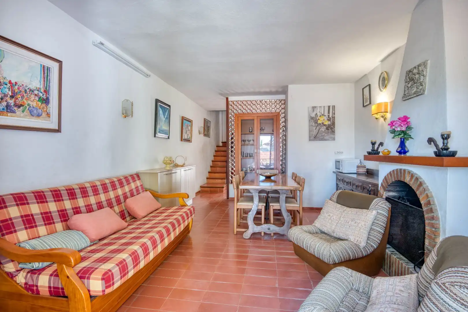 Sala d'estar de Casa adosada en venda en L'Escala amb Terrassa
