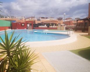 Swimming pool of Attic for sale in Los Montesinos  with Air Conditioner, Terrace and Balcony