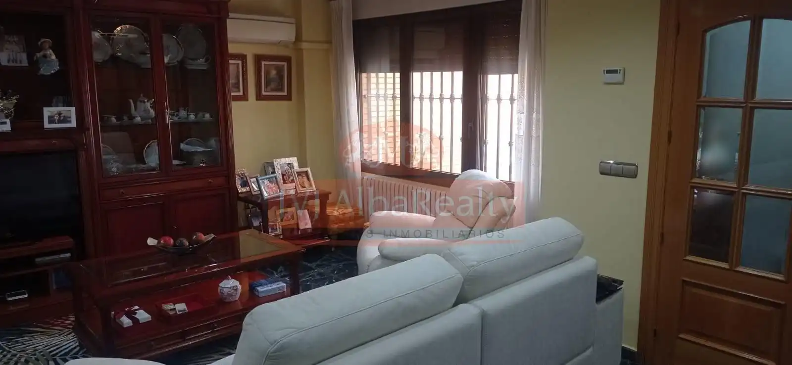 Sala de estar de Casa adosada en venta en Albacete con Aire acondicionado, Calefacción y Jardín privado