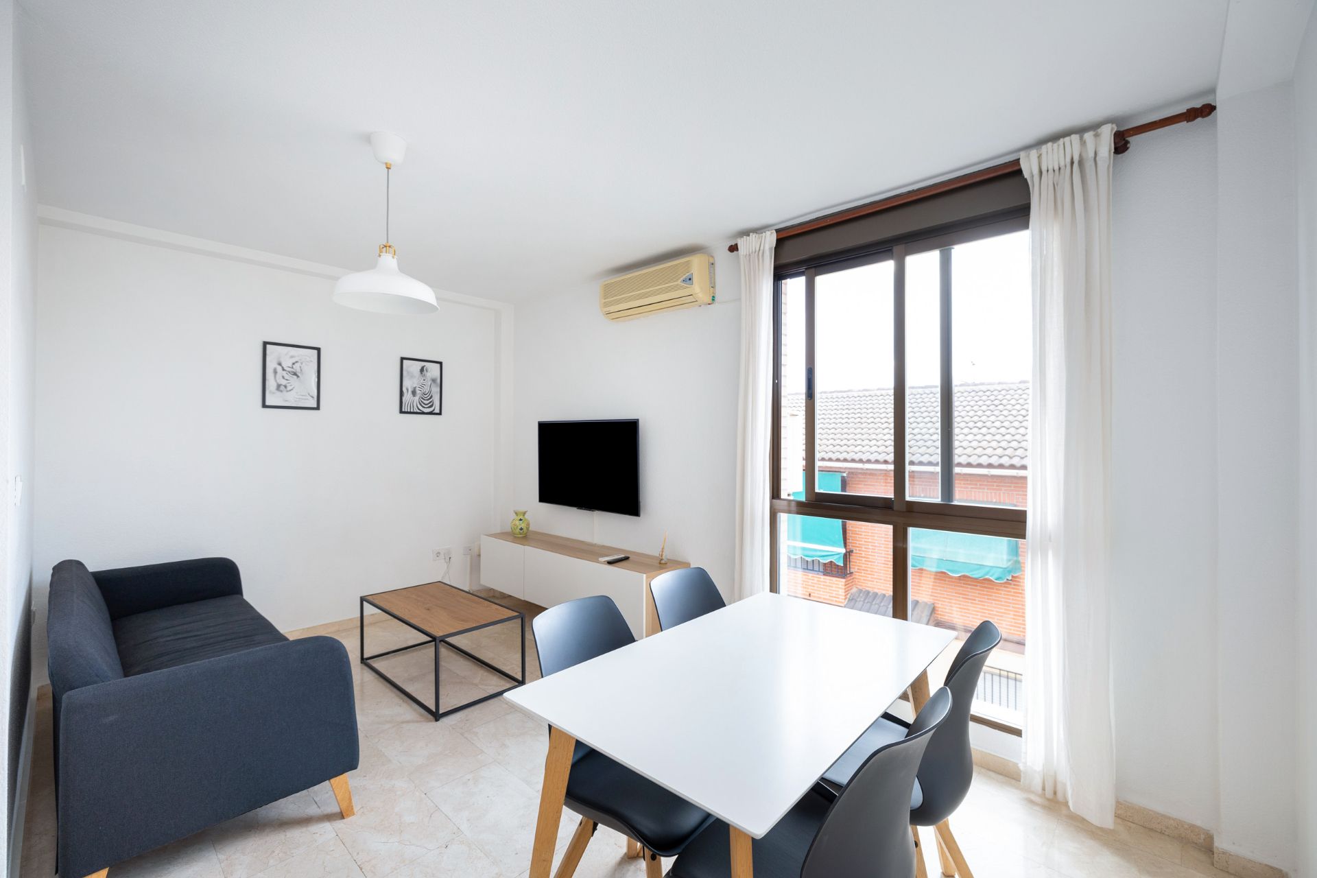 Sala d'estar de Pis en venda en Armilla amb Aire condicionat i Moblat
