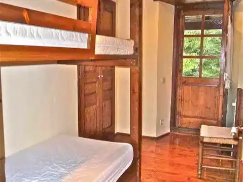 Schlafzimmer von Country house zur Miete in Sallent de Gállego mit Balkon