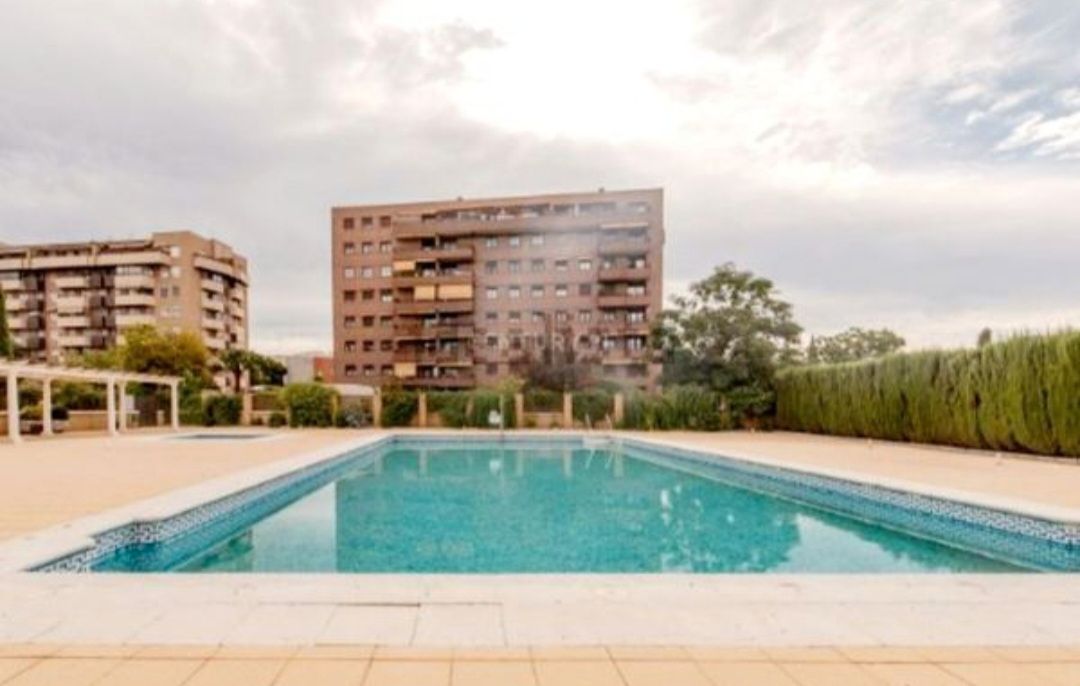 Swimming pool of Flat to rent in  Granada Capital  with Air Conditioner, Heating and Storage room