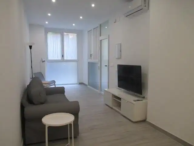 Sala d'estar de Loft de lloguer en Granada amb Aire condicionat i Moblat