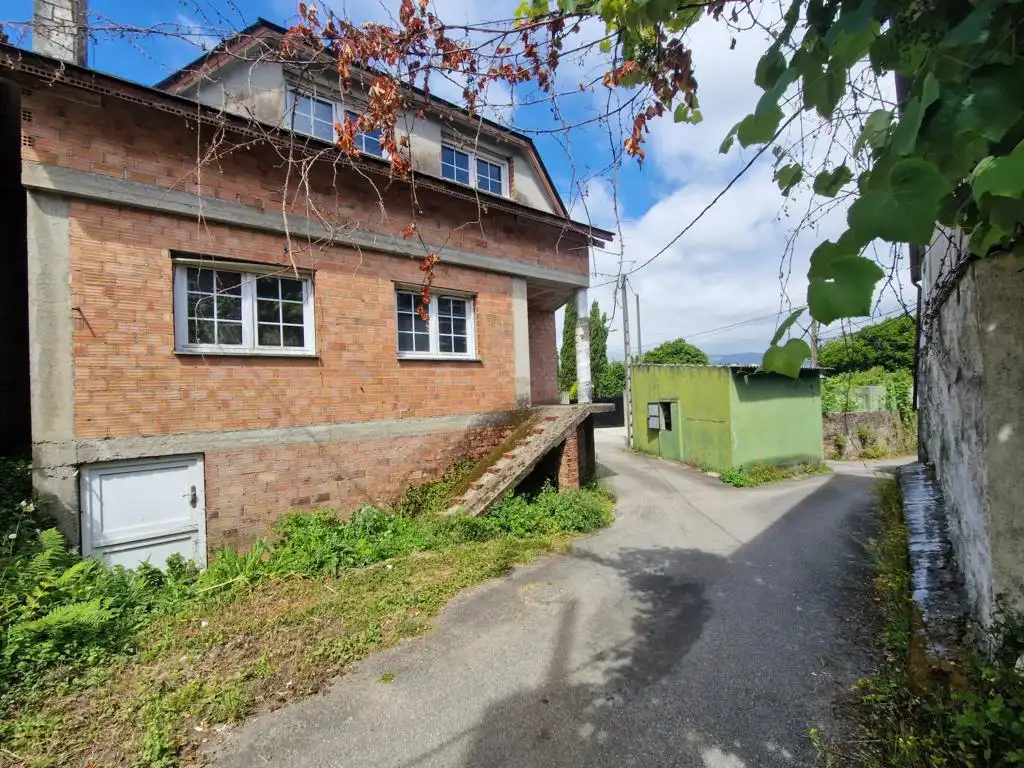 Vista exterior de Casa o xalet en venda en Rianxo amb Jardí privat, Traster i Balcó