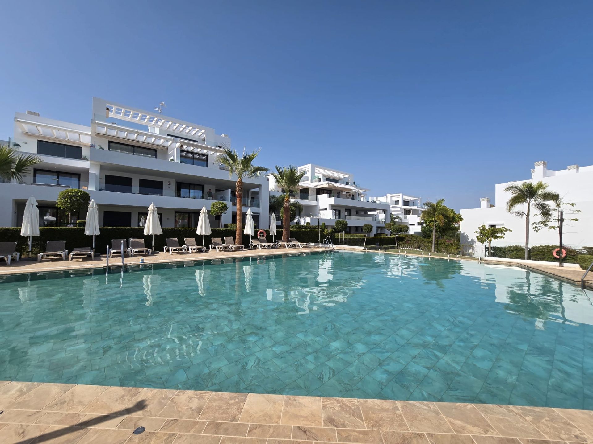 Swimming pool of Flat for sale in Estepona  with Air Conditioner, Private garden and Terrace
