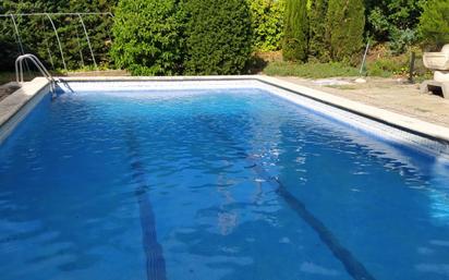 Swimming pool of House or chalet for sale in Caldes de Malavella  with Heating, Terrace and Storage room