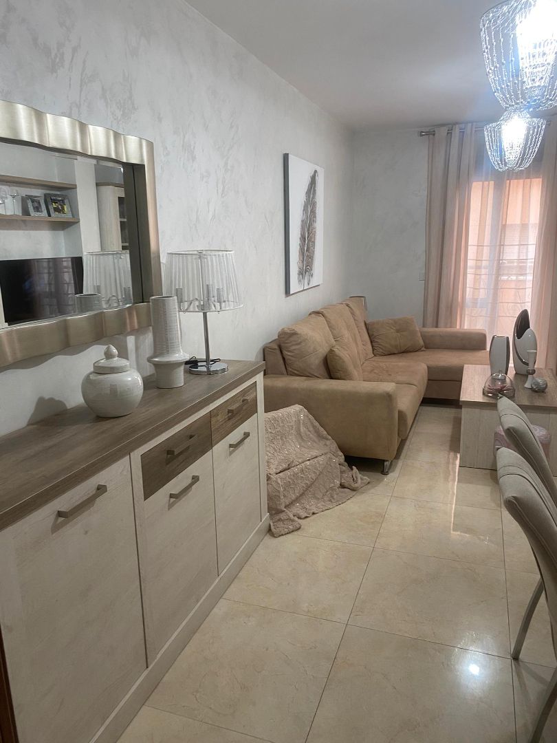 Living room of Flat for sale in  Melilla Capital  with Air Conditioner, Oven and Washing machine