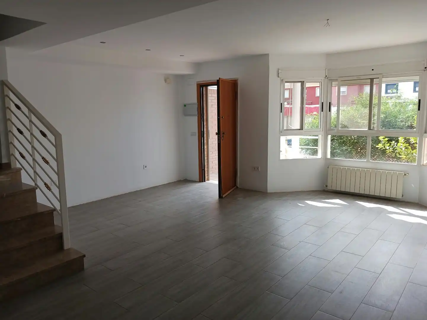 Sala de estar de Casa adosada en venta en Plaza Xúquer