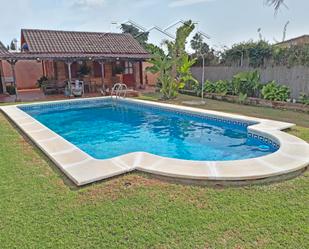 Piscina de Casa adosada en venda en El Puerto de Santa María amb Aire condicionat, Jardí privat i Terrassa