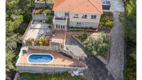 Vista exterior de Casa o xalet en venda en Corbera de Llobregat amb Aire condicionat, Terrassa i Piscina