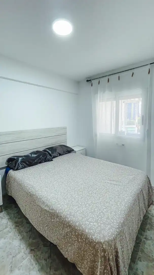 Bedroom of Apartments for sale in Benidorm  with Air Conditioner and Community pool