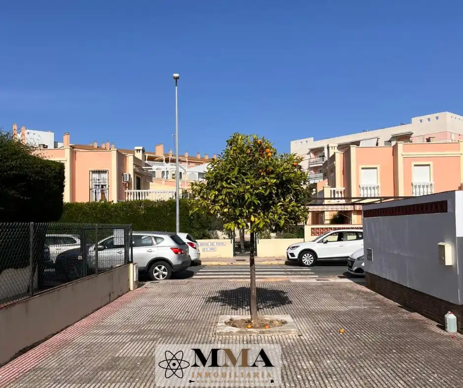 Vista exterior de Casa adosada en venda en El Portil amb Aire condicionat, Calefacció i Jardí privat