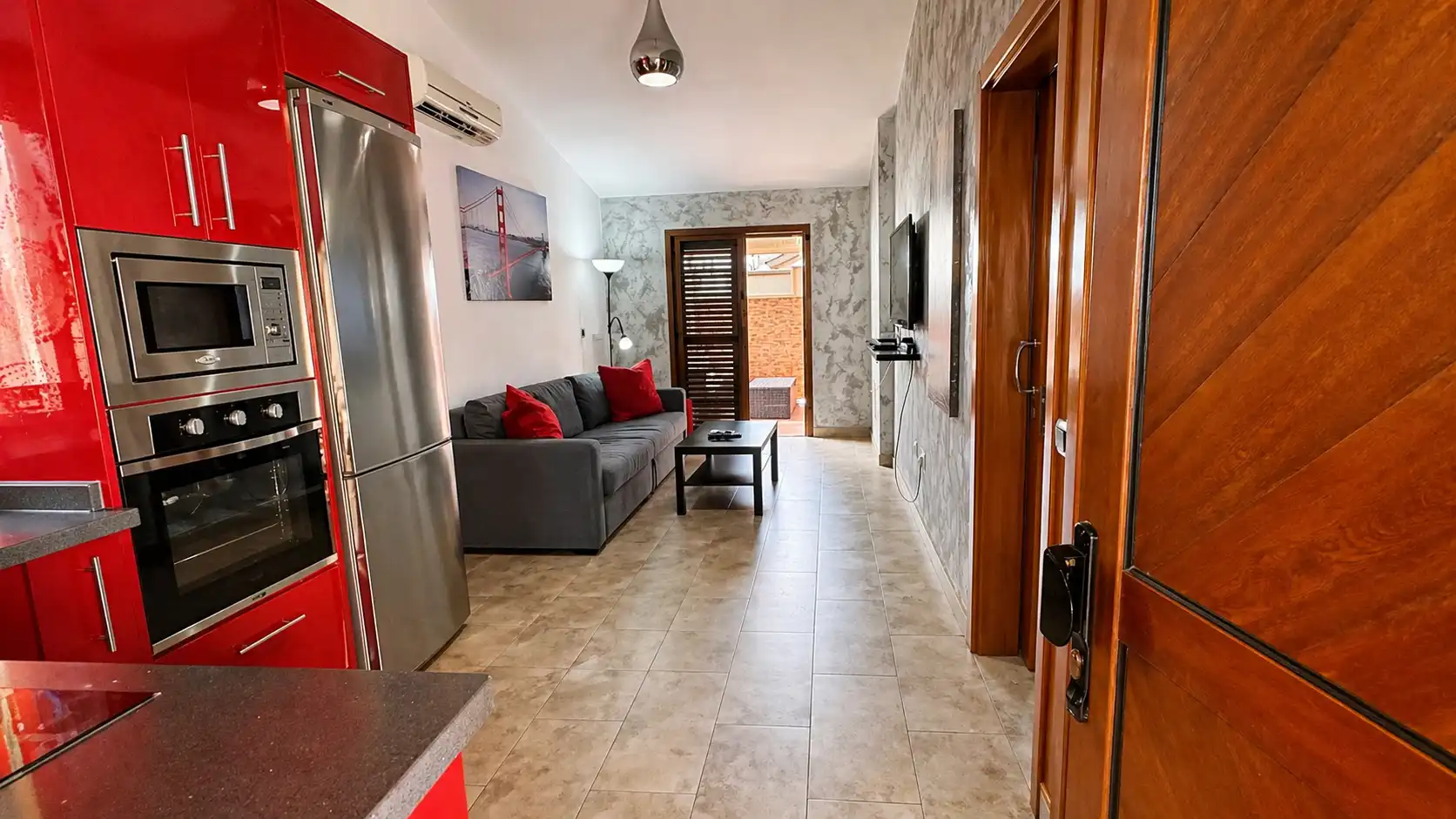 Sala d'estar de Casa o xalet de lloguer en San Bartolomé de Tirajana amb Aire condicionat, Jardí privat i Terrassa