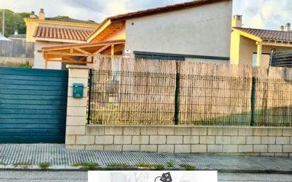 Vista exterior de Casa o xalet en venda en Santa Coloma de Farners amb Calefacció, Jardí privat i Parquet