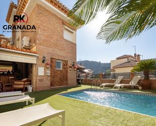 Exterior view of House or chalet for sale in  Granada Capital  with Air Conditioner, Heating and Private garden